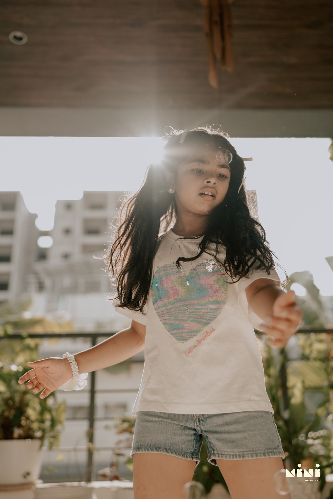 Child in golden light — milestone lifestyle photography Mini Momentz UK