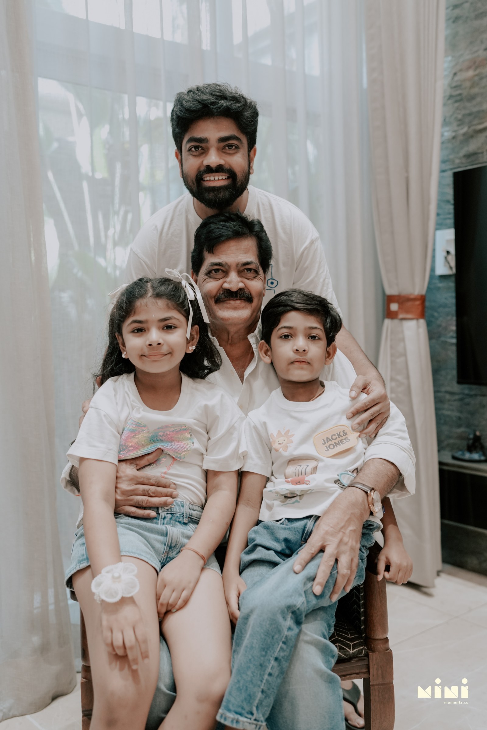 Three generations photographed together during a Mini Momentz family session