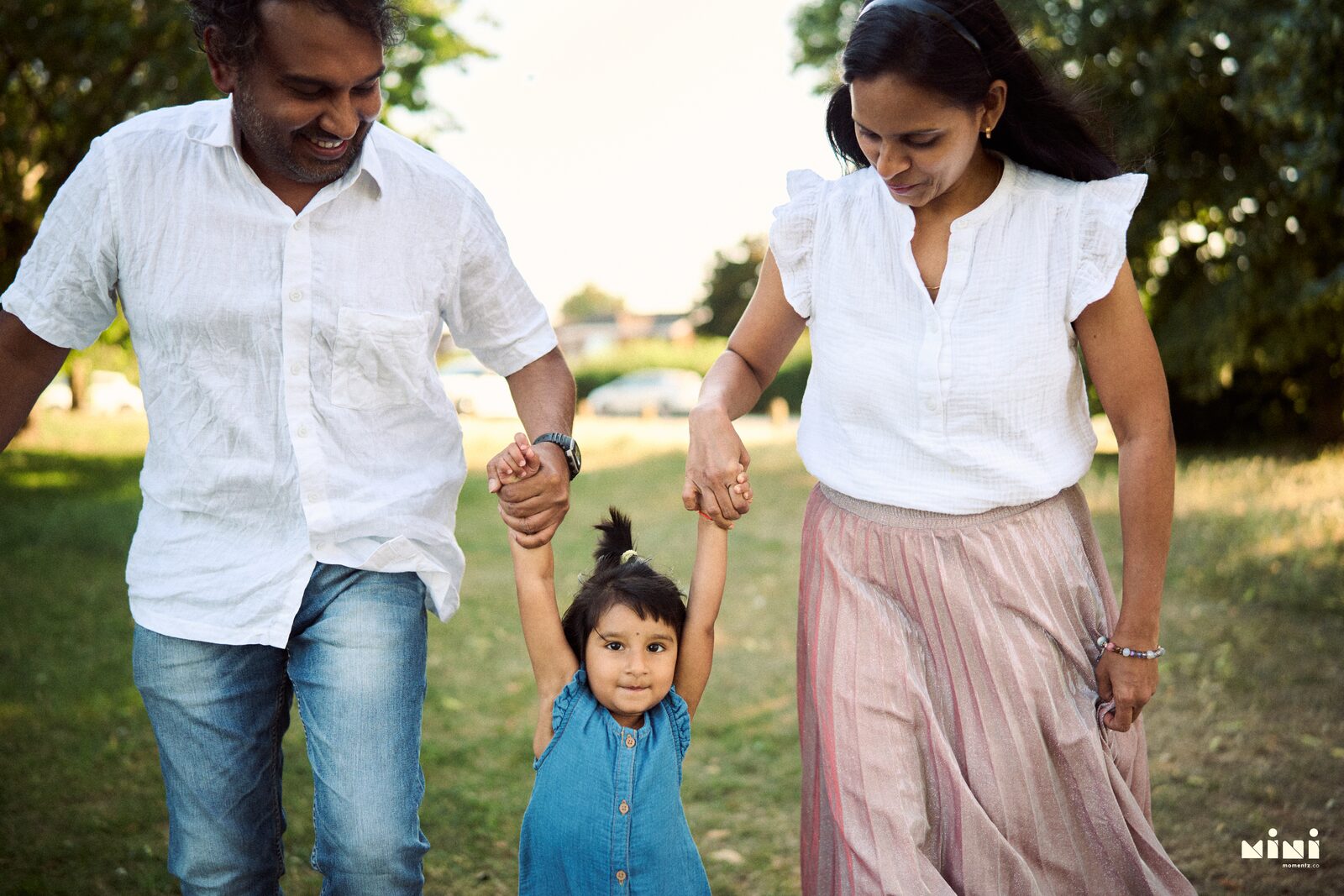 Family walking together in warm evening light